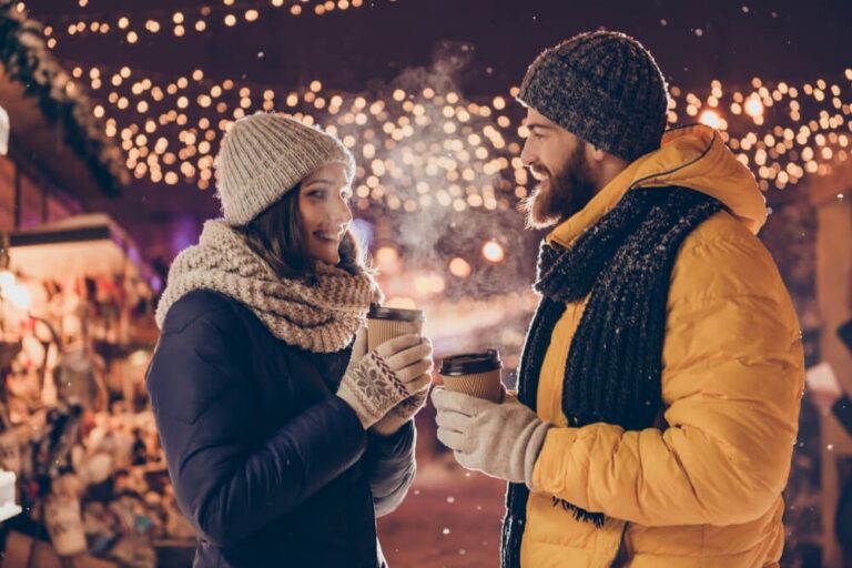 Photo of a Couple Drinking Hot Cocoa During a Wintertime Romantic Getaway in Pennsylvania.