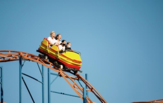 Photo of a group on a rollercoaster with their Hersheypark tickets